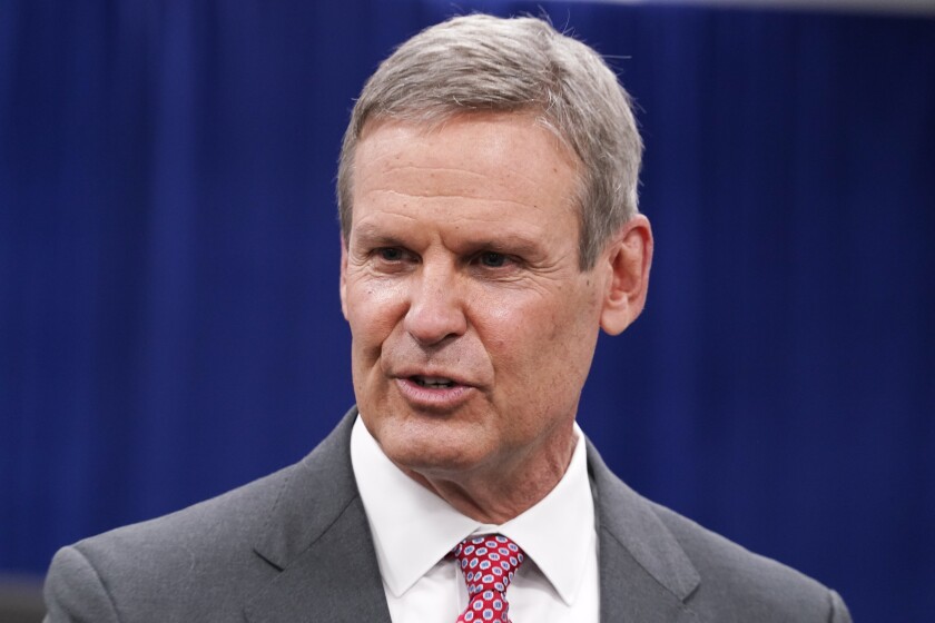 File-This Nov. 10, 2020, file photo shows Tennessee Gov. Bill Lee speaks with reporters in Nashville, Tenn. Lee has tweeted that his wife has mild symptoms of COVID-19 after testing positive for the coronavirus. The Republican governor said Saturday, Dec. 19, 2020, that he has tested negative for the virus but will be quarantined at the Governor’s Residence out of an abundance of caution. (AP Photo/Mark Humphrey, File)