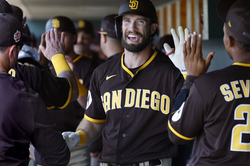 Scottsdale, AZ - February 27: San Diego Padres' David Dahl celebrates after hitting a home run against the San Francisco Giants on Tuesday, February 28, 2023 in Scottsdale, AZ. (K.C. Alfred / The San Diego Union-Tribune)