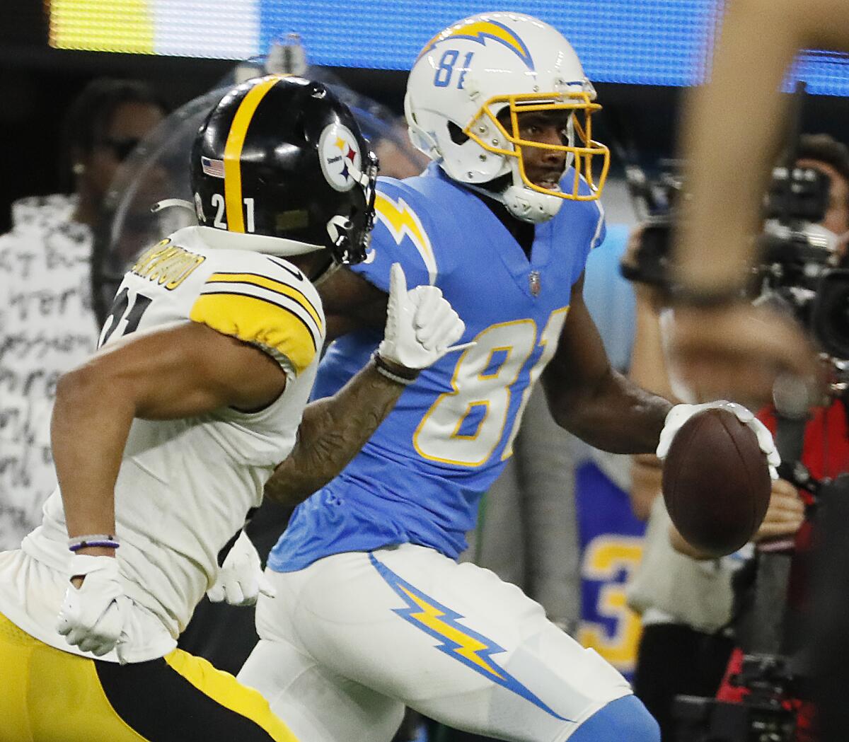 Chargers wide receiver Mike Williams outraces Pittsburgh Steelers cornerback Tre Norwood to score on a 53-yard touchdown.