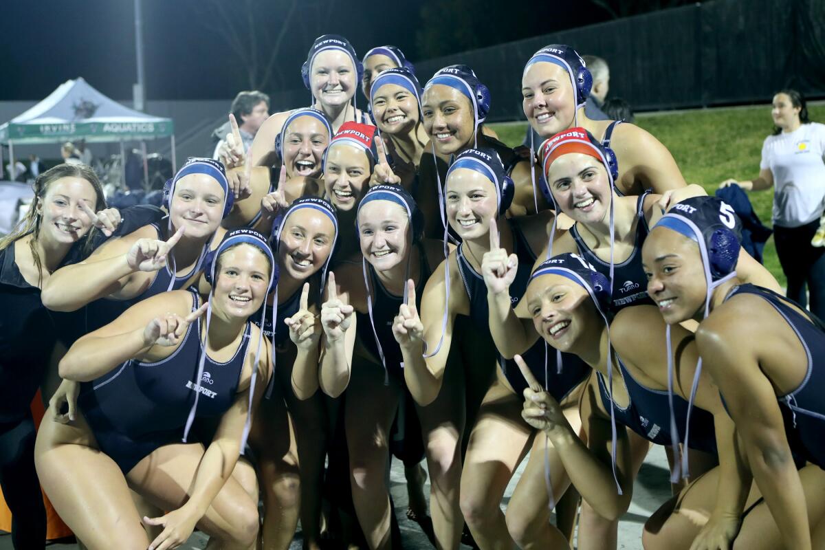 Newport Harbor varsity girls water polo team celebrates their CIF Southern Section Open Division Championship.