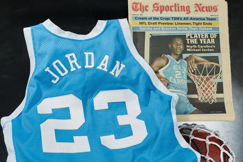 A Michael Jordan North Carolina jersey was photo-matched to be the same one shown on the cover of "The Sporting News."