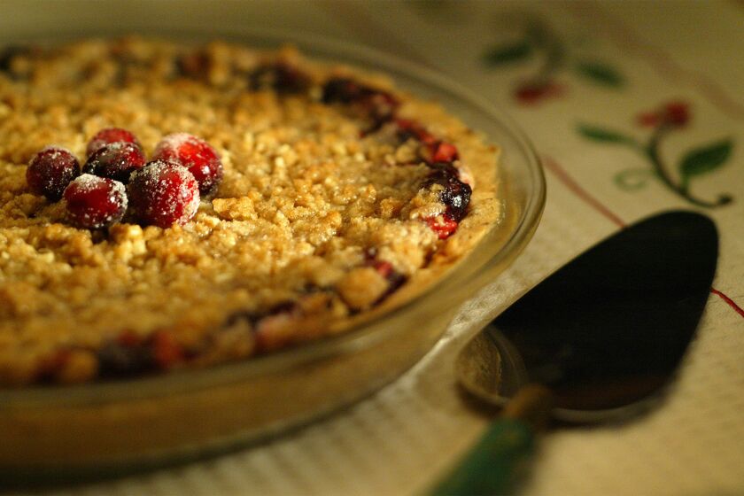 Includes walnut crust, Granny Smith apples and cranberry sauce. Holiday pie recipe.