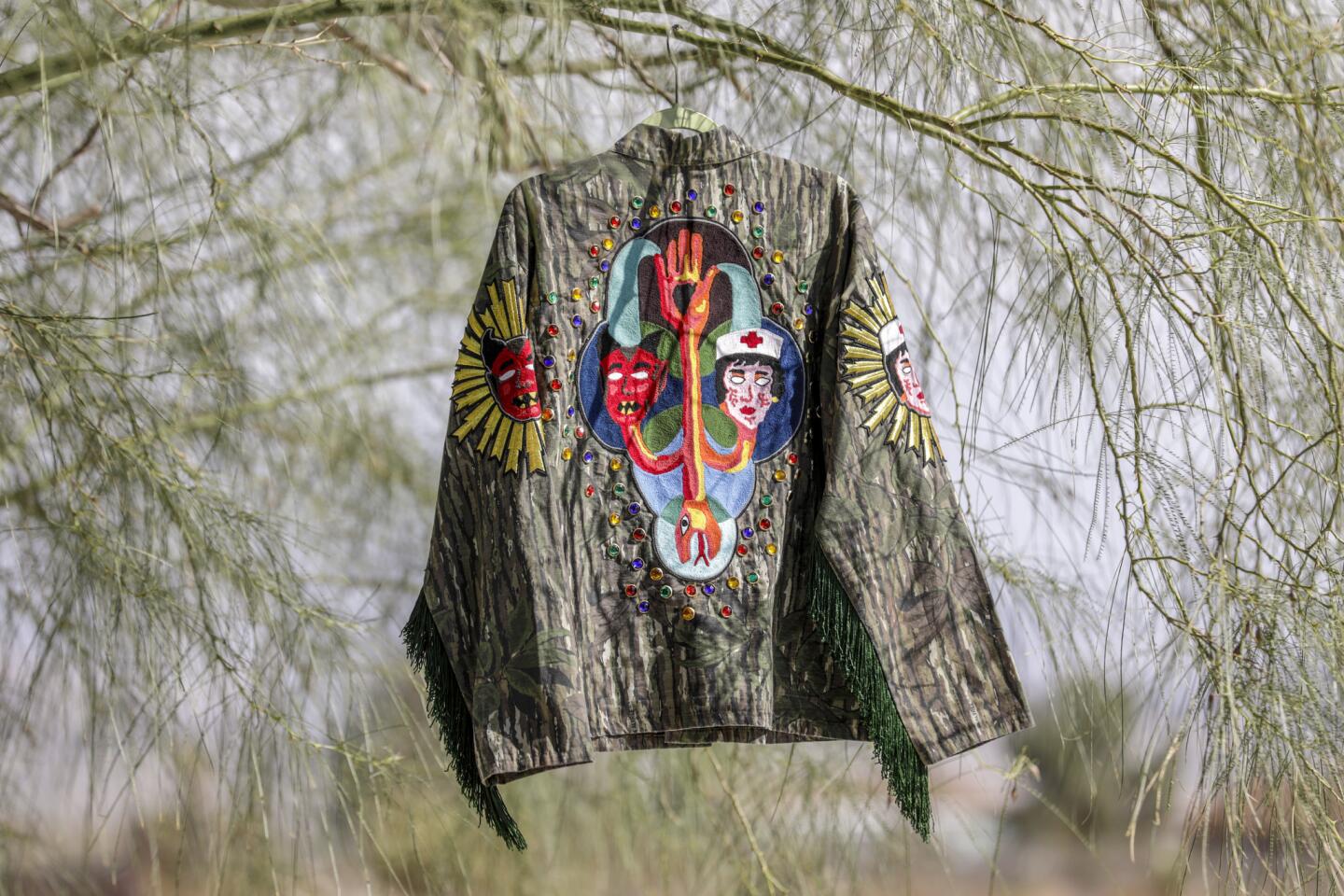 The art jacket “Healer and the Trickster” created by Svetlana Shigroff consists of new, vintage and original chain stitch patches made from tapestries she created.