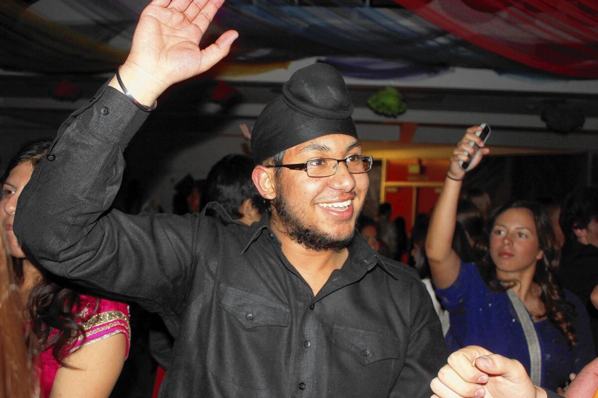 Harcoover Singh Bhatti, Punjabi Club president at Fowler High School in Fowler, Calif., at the Bollywood dance. He vowed to make the dance that they had talked about for years happen at the school.