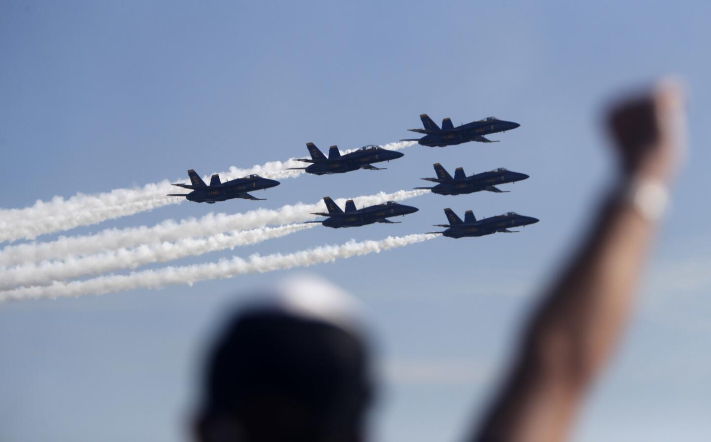 Paul Codorniz, 72 of Tulare, Ca., came for his birthday and saluted the U.S. Navy Blue Angels as they gave one last pass at the second annual Breitling Huntington Beach Airshow, in Huntington Beach, on Saturday, Sept. 30, 2017.