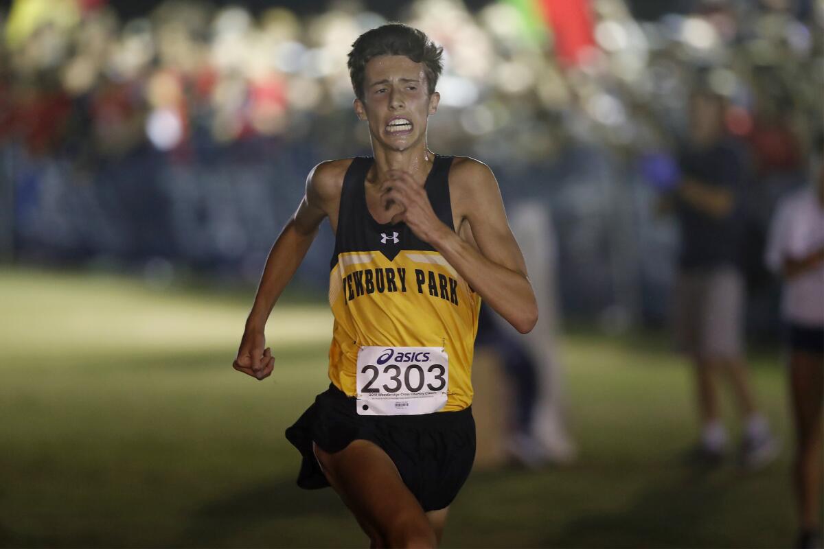 Newbury Park High's Nico Young set a national indoor record in the 3,000 at the Millrose Games in New York on Saturday.