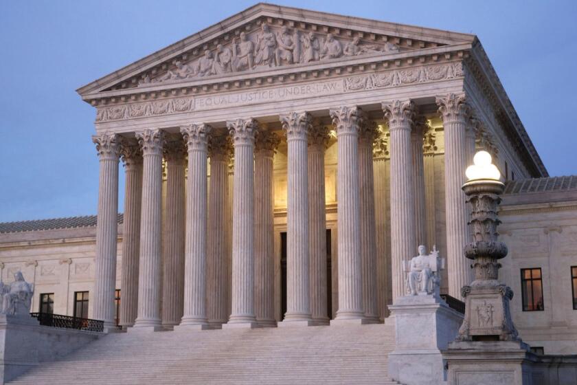 In this May 23, 2019 photo, the U.S. Supreme Court building at dusk on Capitol Hill in Washington. (AP Photo/Patrick Semansky)