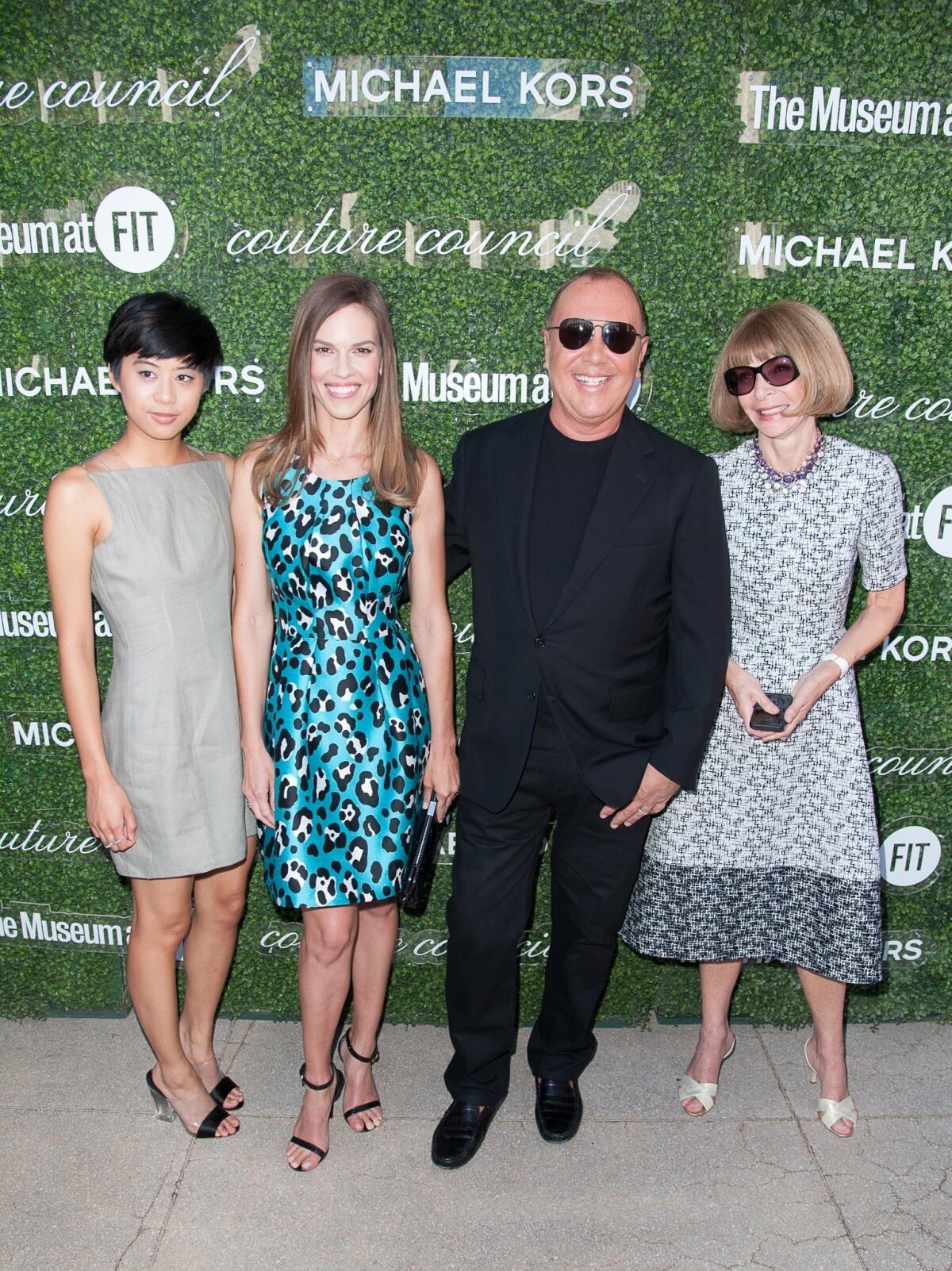 Kim Nguyen, left, Hilary Swank, Michael Kors and Vogue Editor-in-Chief Anna Wintour attend the 2013 Couture Council Fashion Visionary Awards on Wednesday.