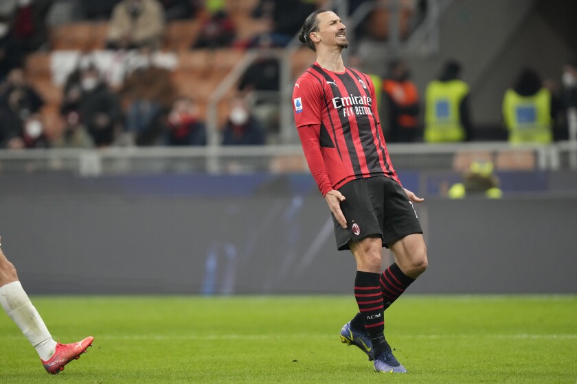AC Milan's Zlatan Ibrahimovic reacts during a Serie A soccer match between AC Milan and Spezia, at the San Siro stadium in Milan, Italy, Monday, Jan.17, 2022. (AP Photo/Luca Bruno)