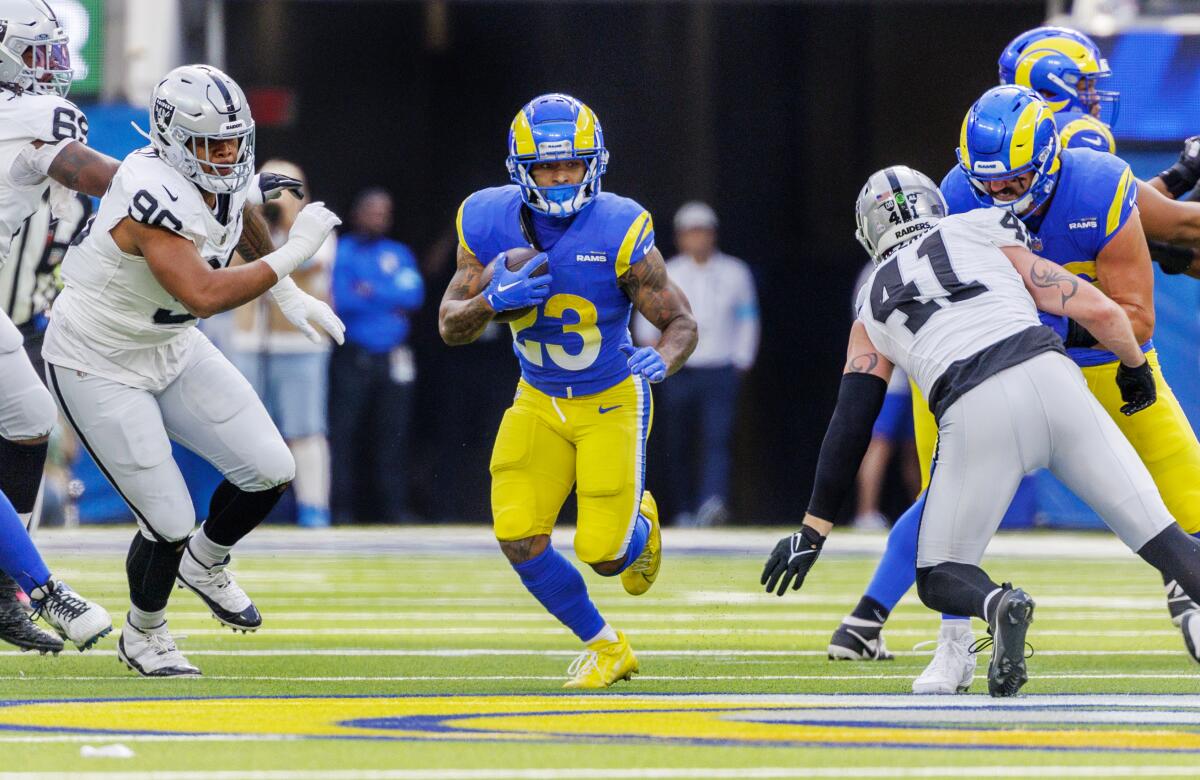  Rams running back Kyren Williams (23) finds a hole in the Raiders defense.