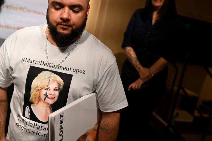 Los Angeles, California May 25, 2023-Jose Antonio Lopez, son of kidnapped victim Maria Del Carmen Lopez, wears a t-shirt of his mother after a press conference in Los Angeles Wednesday. (Wally Skalij/Los Angeles Times)
