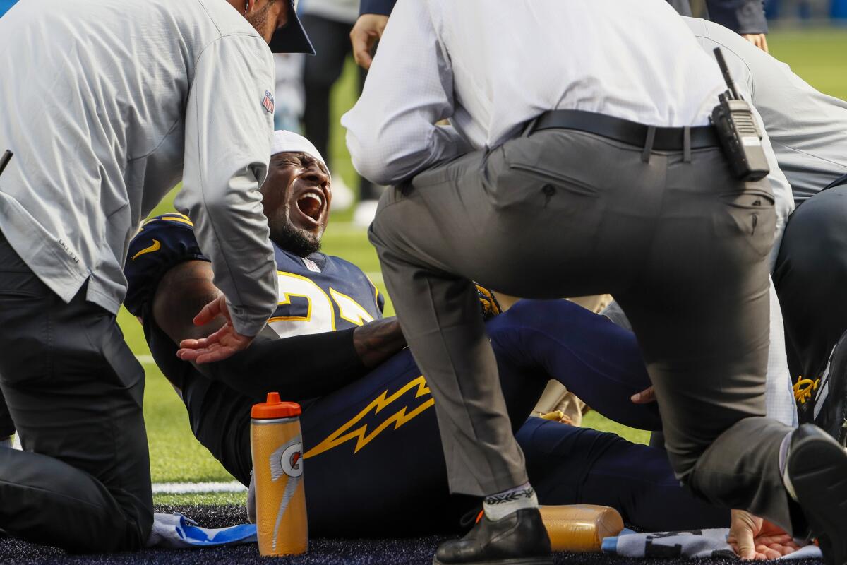  Chargers cornerback J.C. Jackson (27) screams after suffering an apparent knee injury in a game against Seattle.