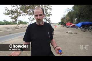 Homeless entrenched in booming tent city along Santa Ana River