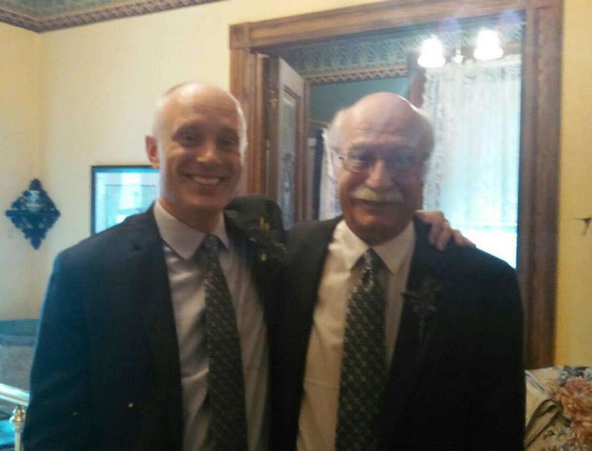 Matthew T. Hall (left) and his father, Douglas D. Hall, in 2014