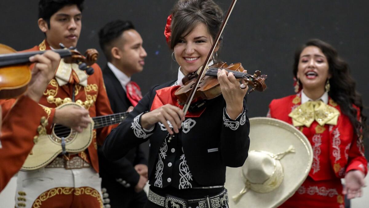 Svetlana Kalpakchi, from Ukraine, is a classically trained violinist.