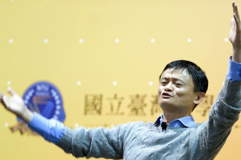 This photo taken on March 3, 2015 shows founder and executive chairman of Alibaba Group, Jack Ma, gesturing during a speech at National Taiwan University (NTU) in Taipei. Taiwan has snubbed a multi-million dollar funding pledge by China's e-commerce giant Alibaba designed to encourage the island's young entrepreneurs, saying youth talent should stay away from the mainland, it was reported on March 4. AFP PHOTO / Sam YehSAM YEH/AFP/Getty Images ORG XMIT: