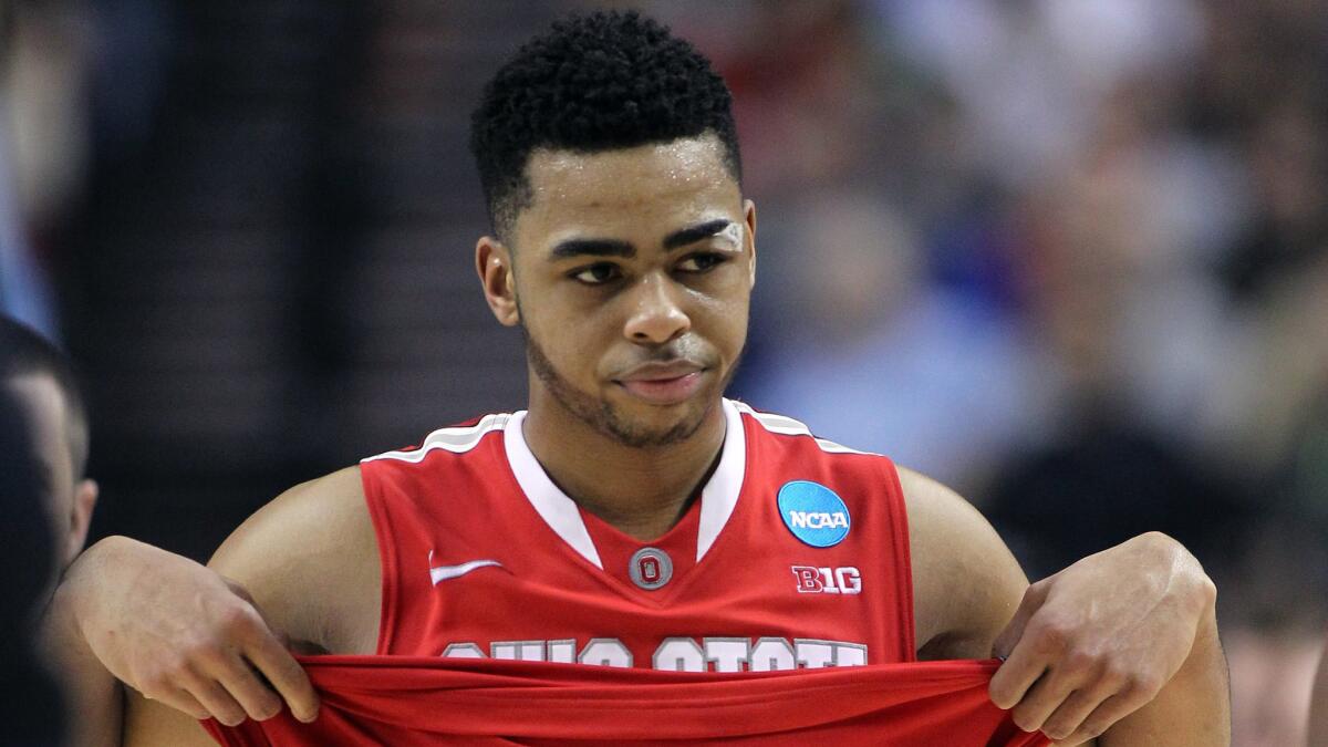 Ohio State guard D'Angelo Russell walks toward the bench during the Buckeyes' 73-58 loss to Arizona in the NCAA tournament on March 21.