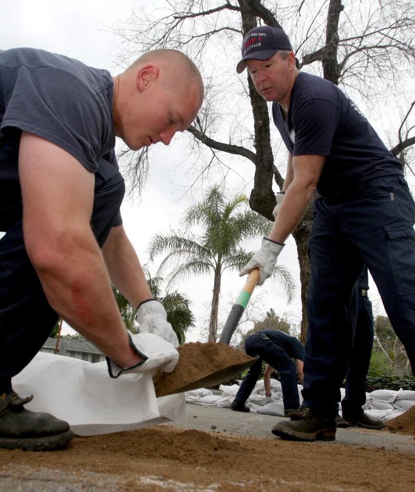 Photo Gallery: LA County fire distributes thousands of sandbags to La Crescenta residents