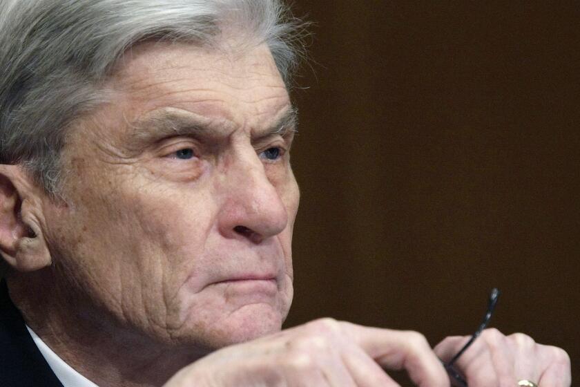 ** FILE ** In this April 8, 2008 file photo, then Senate Armed Services Committee member Sen. John Warner, R-Va., listens to testimony on Capitol Hill in Washington. Warner, a former Navy secretary and one of the Senate’s most influential military experts, has died at 94. (AP Photo/Pablo Martinez Monsivais, File)