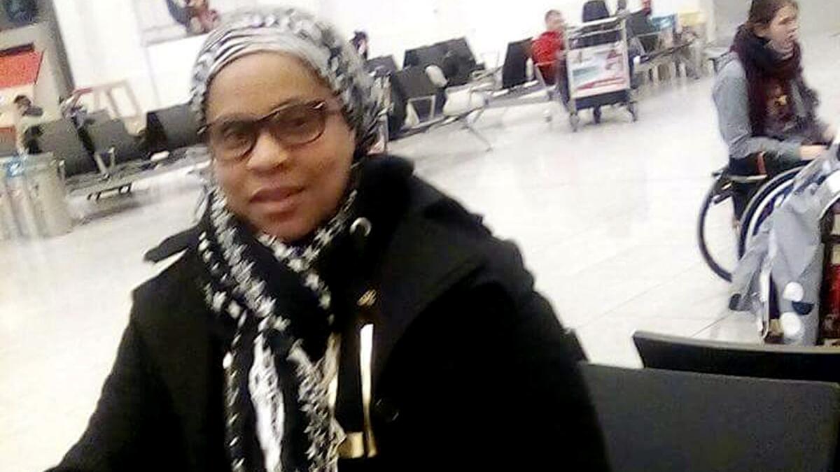 Elita Borbor Weah stands in the Brussels Airport shortly before bombs went off nearby. Weah, who was on her way to Rhode Island for her stepfather's funeral, texted the photo of herself to family members just before she died in the attack.