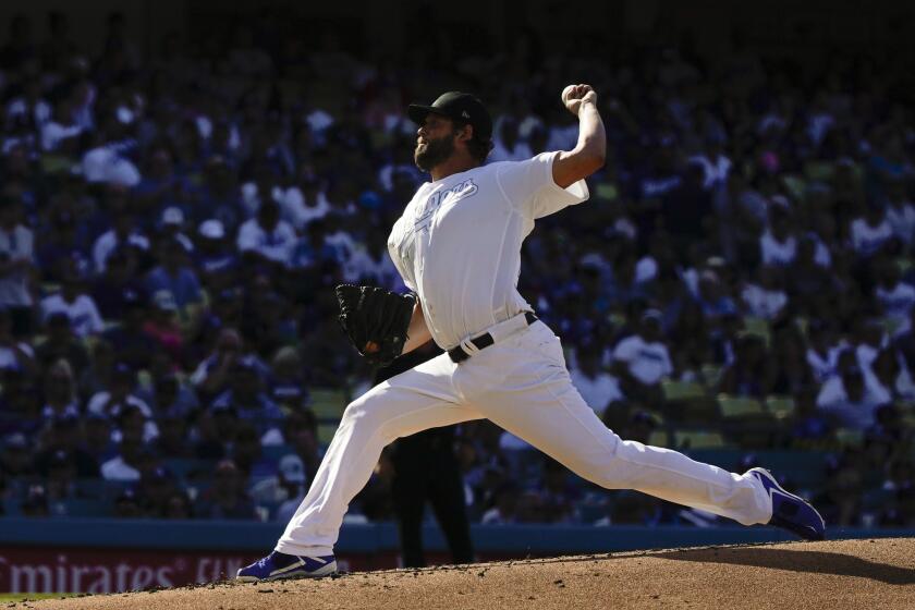 LOS ANGELES, CALIF. - AUGUST 25: Los Angeles Dodgers starting pitcher Clayton Kershaw (22) pitches against the New York Yankees during a Major League Baseball game at Dodger Stadium on Sunday, Aug. 25, 2019 in Los Angeles, Calif. (Kent Nishimura / Los Angeles Times)