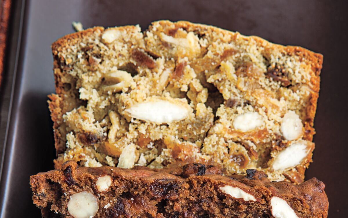 Homemade almond paste and dried pears, apples and apricots create a light-colored rendition of this classic holiday cake.