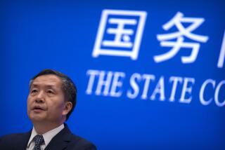Shen Hongbing, the director of the Chinese Center for Disease Control and Prevention, speaks at a press conference on the origins of COVID-19 at the State Council Information Office in Beijing, Saturday, April 8, 2023. (AP Photo/Mark Schiefelbein)