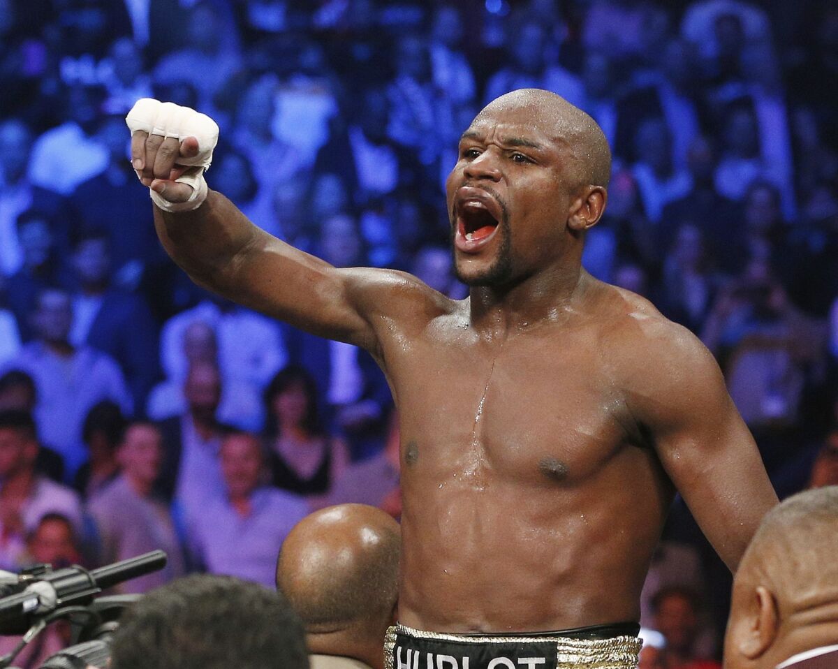 Floyd Mayweather Jr. celebrates his victory over Manny Pacquiao in May.