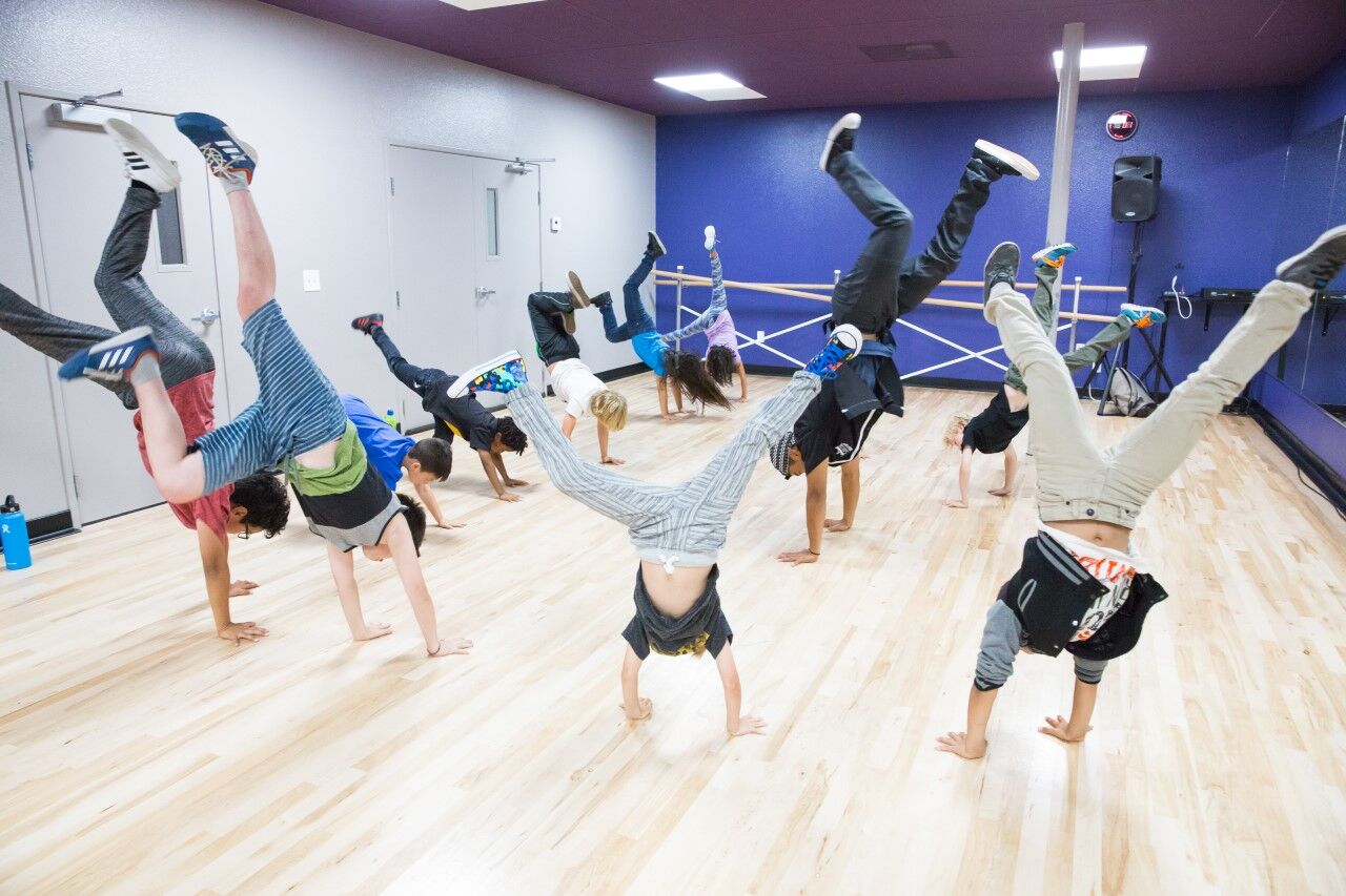 Dancers practice at Culture Shock Dance Studio in San Diego