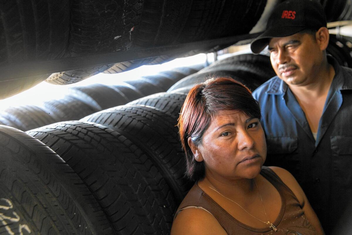 Yolanda Dominguez, 39, a tire shop owner, and Jose Viramontes, 39, her employee, are two parents who have never had an extensive conversation about the police with their children.