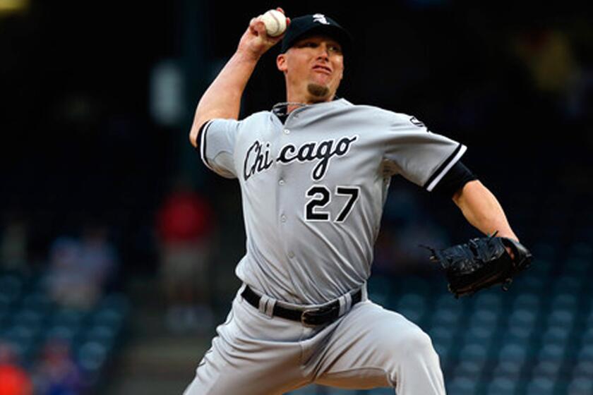 Matt Lindstrom, while playing for the Chicago White Sox, delivers a pitch against during a game last season against the Texas Rangers.