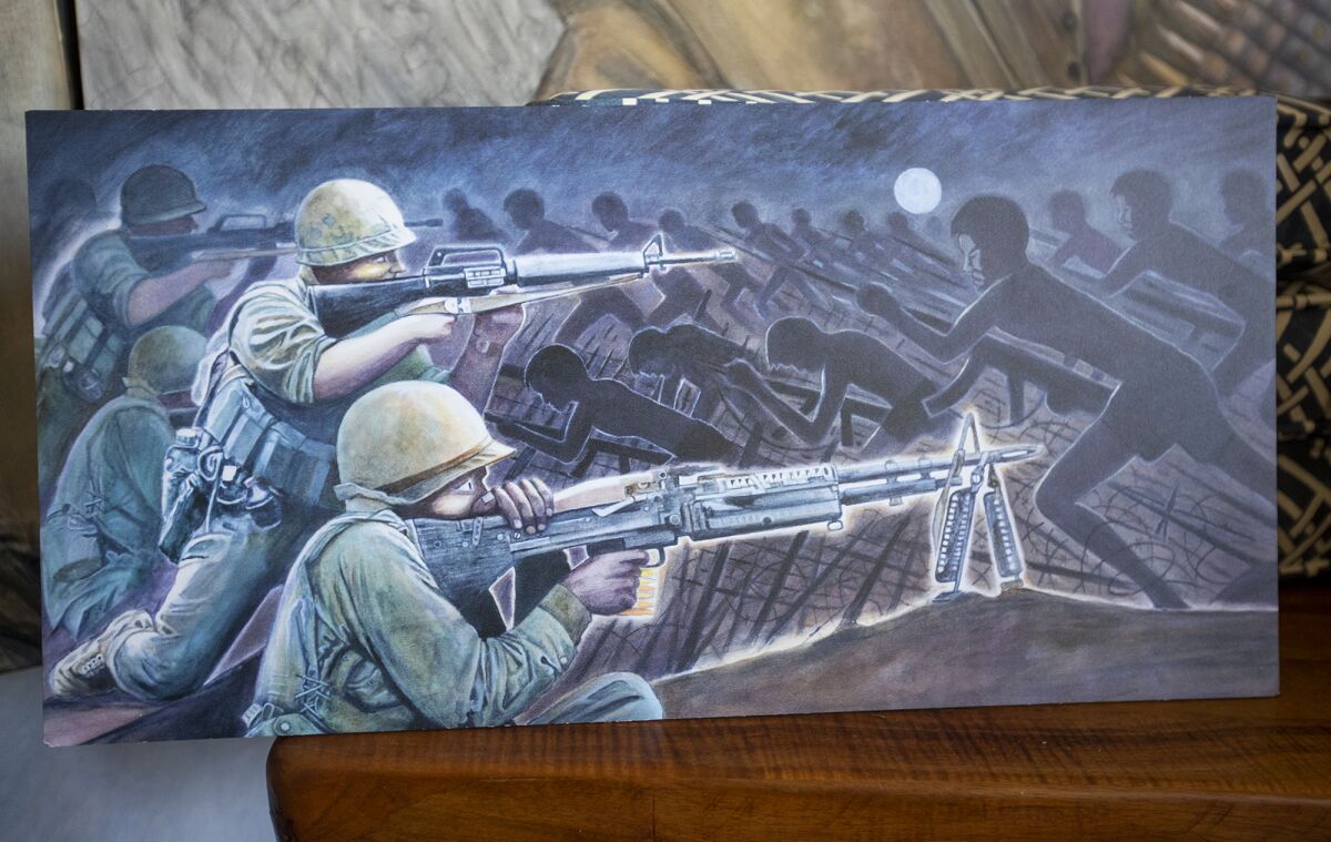 A painting shows soldiers squaring off against shadowy combatants.