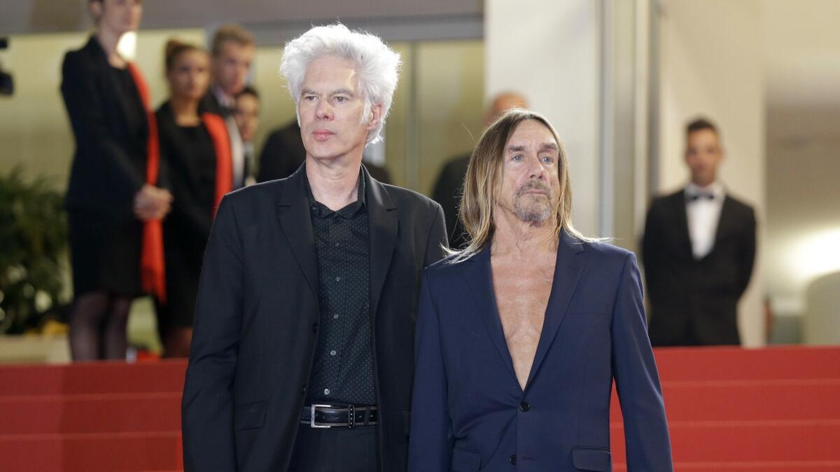 Director Jim Jarmusch and singer Iggy Pop arrive at the 2016 Cannes Film Festival premiere of the documentary "Gimme Danger."