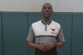 Leon Jacob, who played basketball overseas, is in his second year as head coach at Angelou.