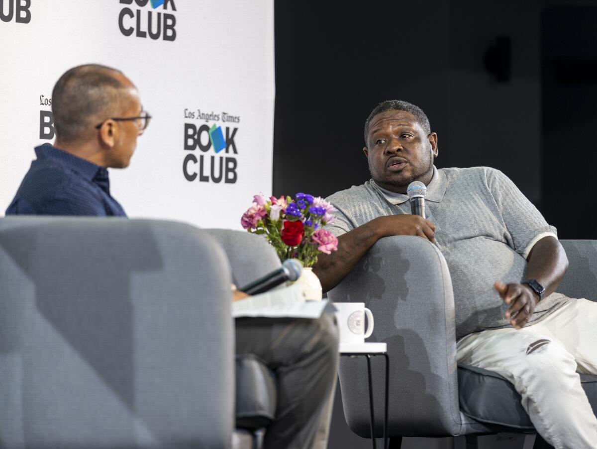 Chef Keith Corbin, right, discusses "California Soul" with Times Food editor Daniel Hernandez.