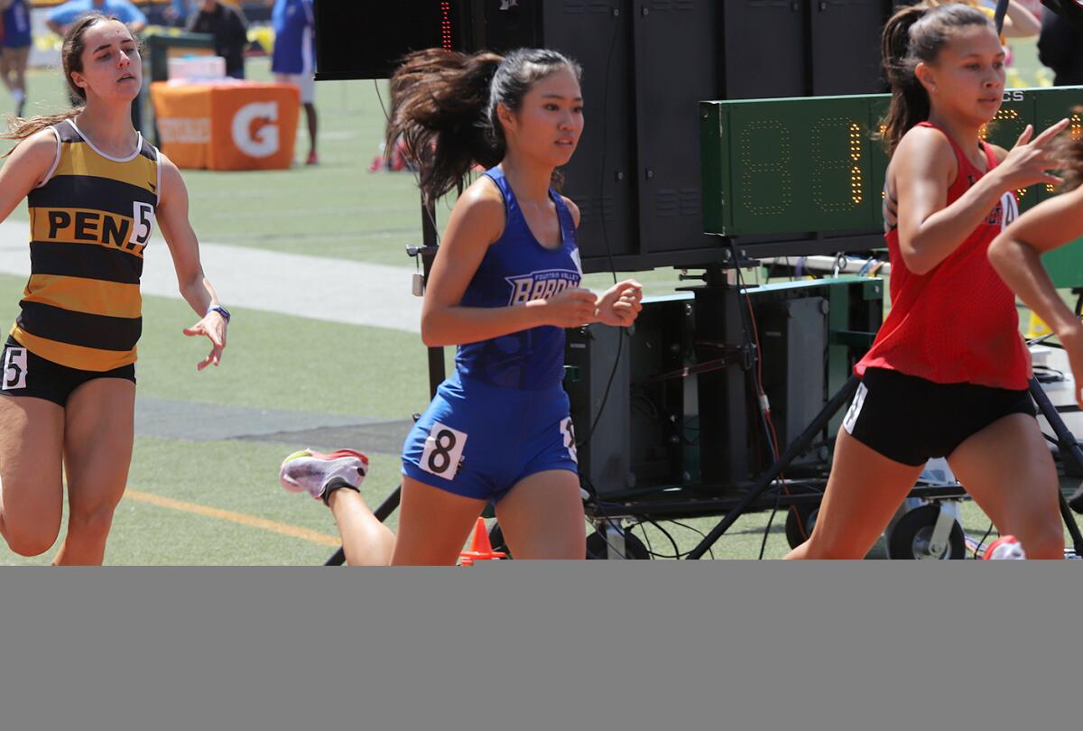 Fountain Valley's Kaho Cichon in the girls' 800 meters during the CIF Southern Section Masters Meet on Saturday.