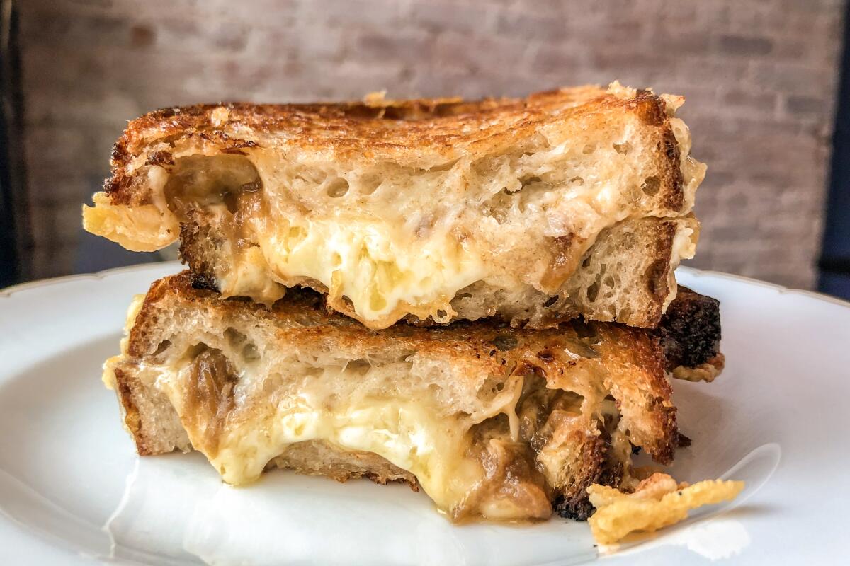 The grilled cheese at Pasjoli in Santa Monica: Gruyére cheese, mornay sauce and caramelized onions on country bread.