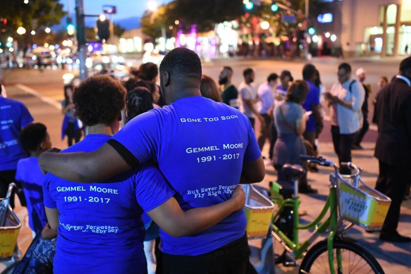 WEST HOLLYWOOD, CALIFORNIA AUGUST 18, 2017-Friends, family and supporters gather for a candelight vigil outside the West Hollywood Sheriff's station Friday. Gemmel Moore was found dead of a drug overdose in the home of prominent Democratic donor Ed Buck and the family wants an investigation. (Wally Skalij/Los Angeles Times)