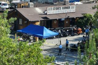 Trabuco Canyon, CA - August 24: An aerial view of investigators working the scene where a gunman killed three people and six were taken to hospitals after a shooting Wednesday night at Cook's Corner, a landmark biker bar at Cook's Corner in Trabuco Canyon Thursday, Aug. 24, 2023. An Ex-cop is the suspected gunman in mass shooting at O.C. biker bar, sources say; 4 dead, 6 injured. (Allen J. Schaben / Los Angeles Times)