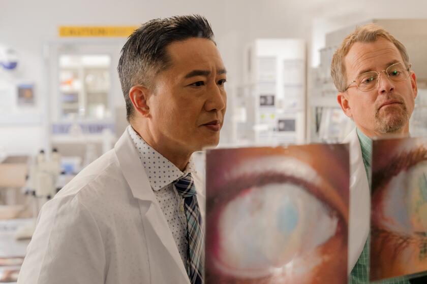Dr. Wang (Terry Chen) and Dr. Bartnovsky (Greg Kinnear) in "Sight."