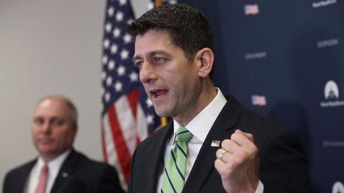 House Speaker Paul D. Ryan (R-Wis.) answers reporters' questions after a meeting of the House Republican caucus.