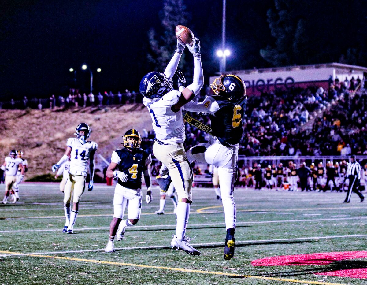 Arlis Boardingham of Birmingham completes magnificent catch in end zone for touchdown against San Pedro.