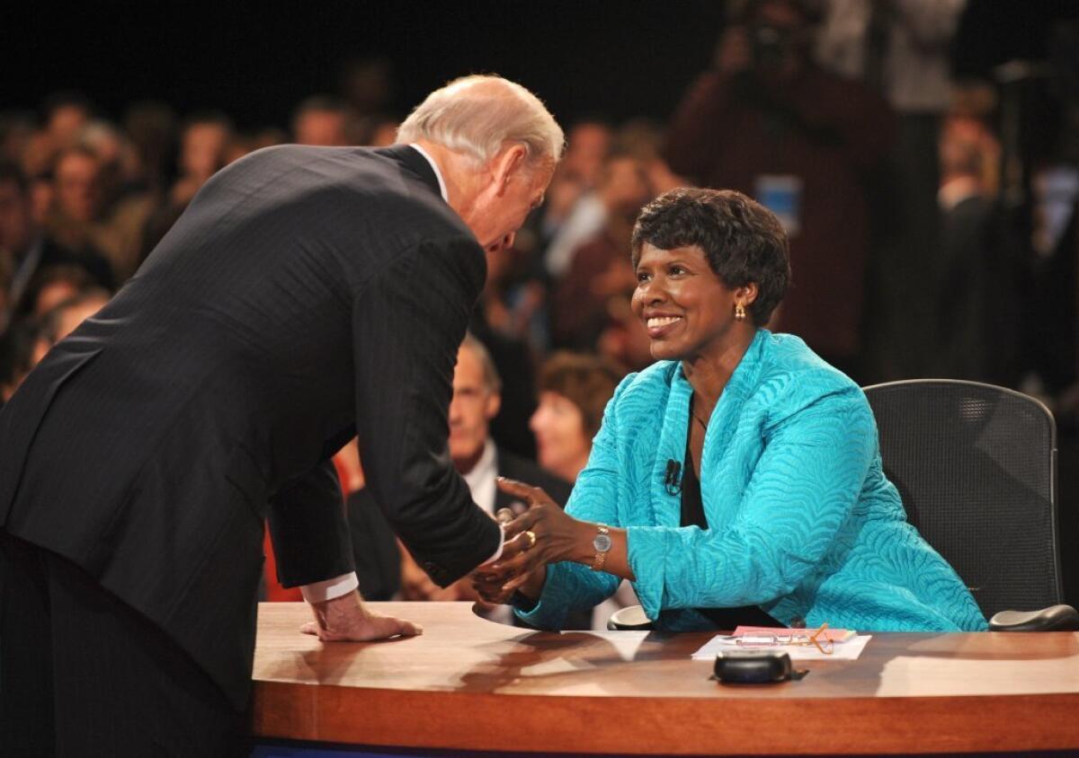 Gwen Ifill with then-Democratic vice presidential nominee, Sen. Joe Biden, at the end of the 2008 vice presidential debate.
