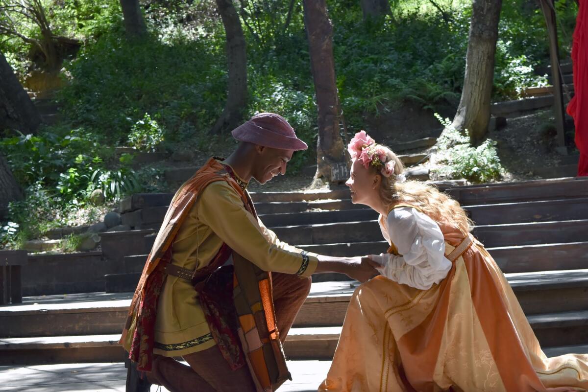 Two costumed actors perform in a production of "The Winter's Tale" at Theatricum Botanicum in Topanga Canyon.