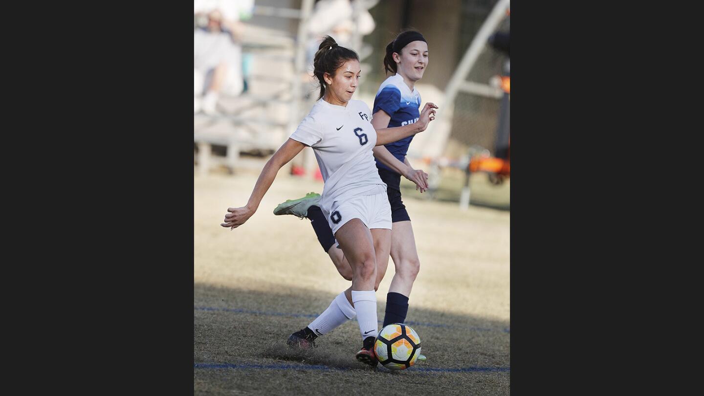 Flintridge Prep's Julia Gonzalez shoots from the 18 to score her first and the teams third goal of the game in a Prep League girls' soccer game at Flintridge Preparatory on Thursday, January 18, 2018.