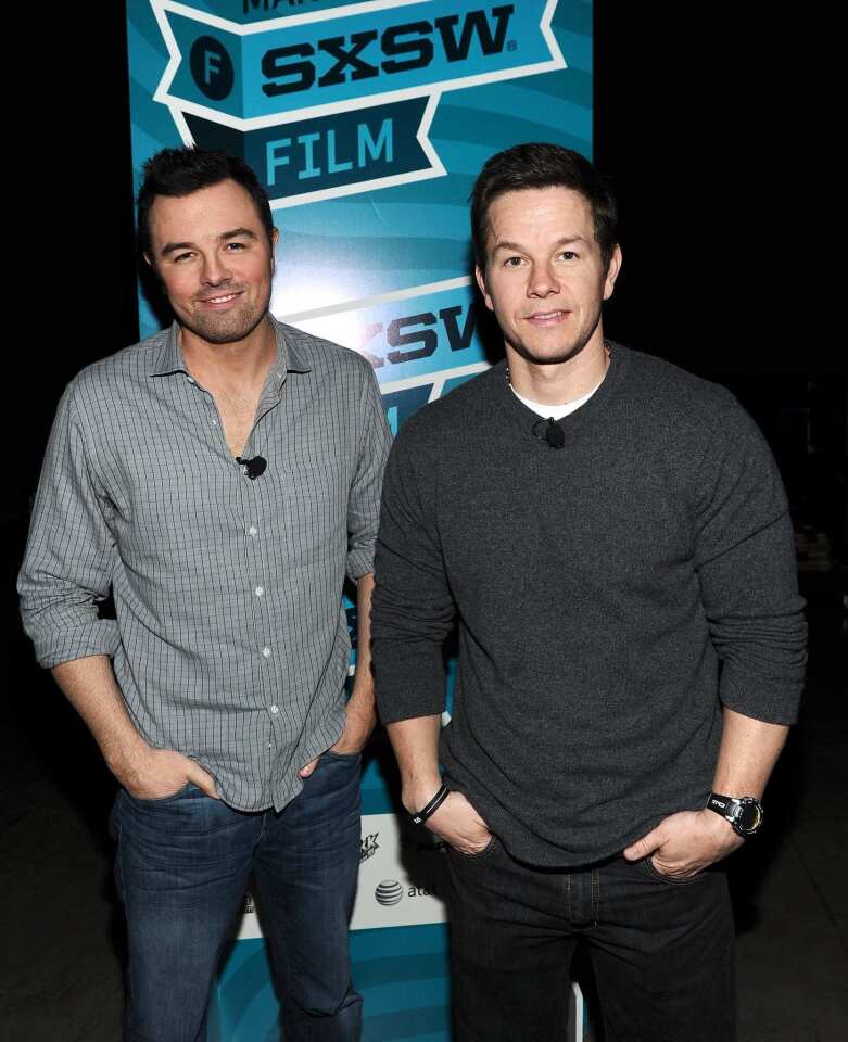 Seth MacFarlane, left, and Mark Wahlberg attend the "A Conversation With Seth MacFarlane" panel.