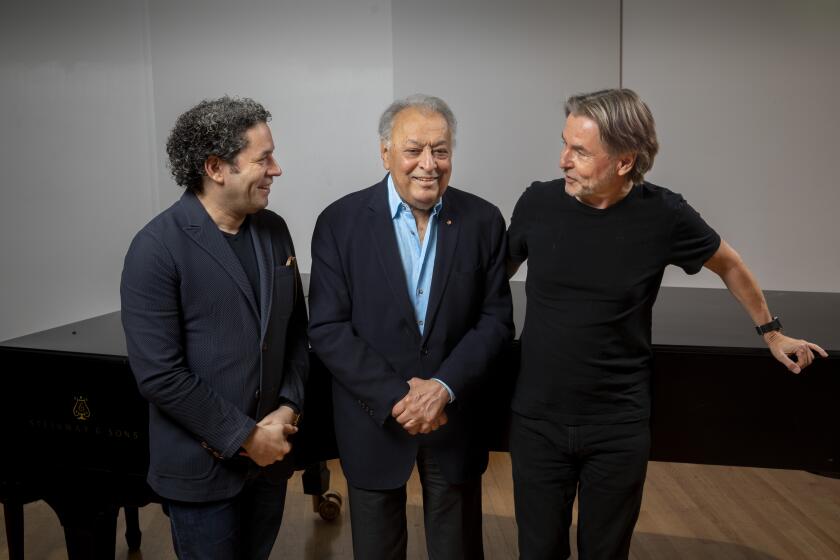 LOS ANGELES, CA --OCTOBER 22, 2019 — The three living LA Phil Music Directors, Gustavo Dudamel (Music & Artistic Director), Zubin Mehta (Conductor Emeritus) and Esa-Pekka Salonen (Conductor Laureate) from left, are photographed before a rehearsal, at Walt Disney Concert Hall, in downtown Los Angeles, CA, Oct.22, 2019. The three will be conducting the LA Phil in a Centennial Birthday Celebration Concert & Gala, Thursday, Oct. 24., and for the final piece, the three will conduct together a piece written by Icelandic composer Daníel Bjarnason. (Jay L. Clendenin / Los Angeles Times)