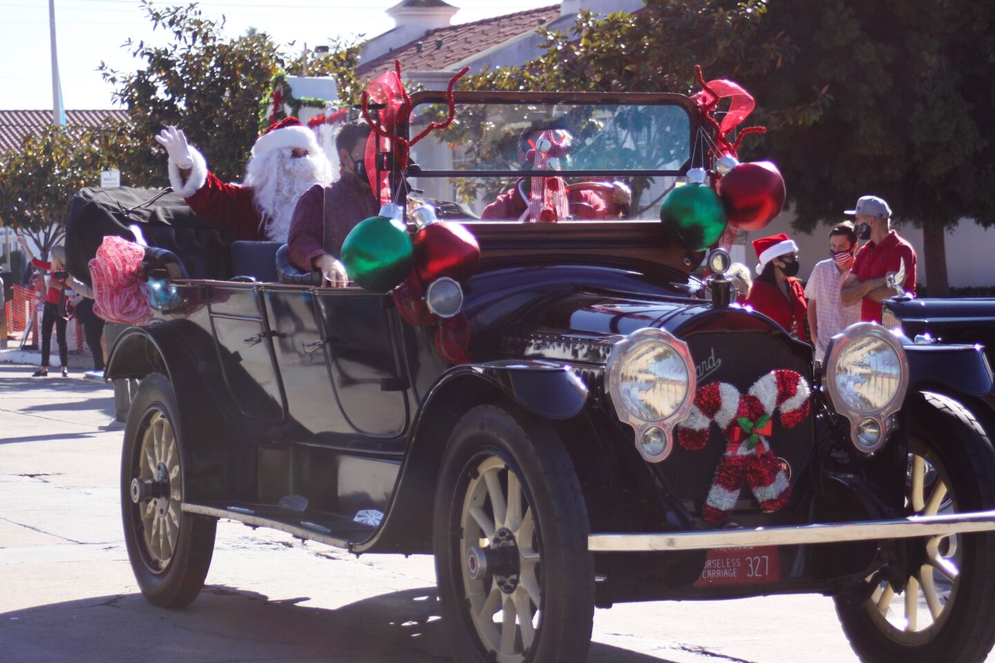 Santa Claus makes his entrance in the Old Black Goose as part of the La Jolla Christmas Parade festivities Dec. 6.