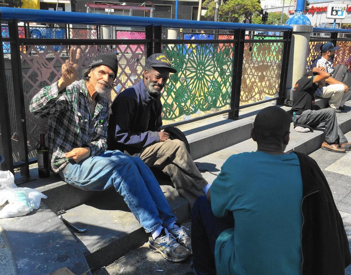 At the BART plaza at 16th and Mission streets in San Francisco, Bill Garza, left, and Ronnell Hunt talked about how hard it is to find a restroom.