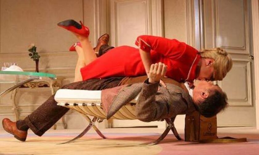 BRINGING BACK THE FARCE: Kathryn Hahn kisses Mark Rylance in a scene from the sexy on-stage romp, "Boeing, Boeing."